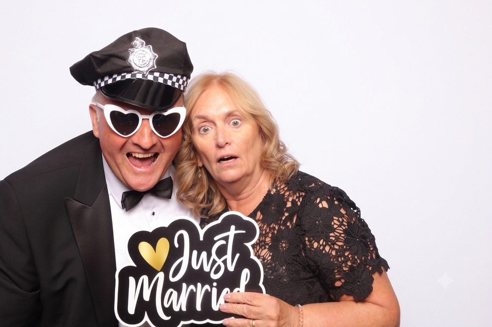 Wedding guests with a Just Married sign